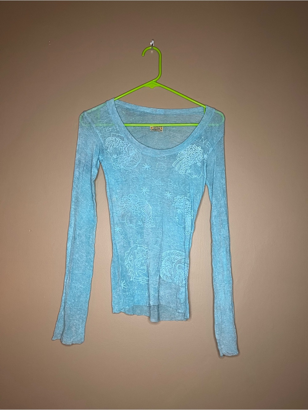 The People of the Labyrinths blue knit top